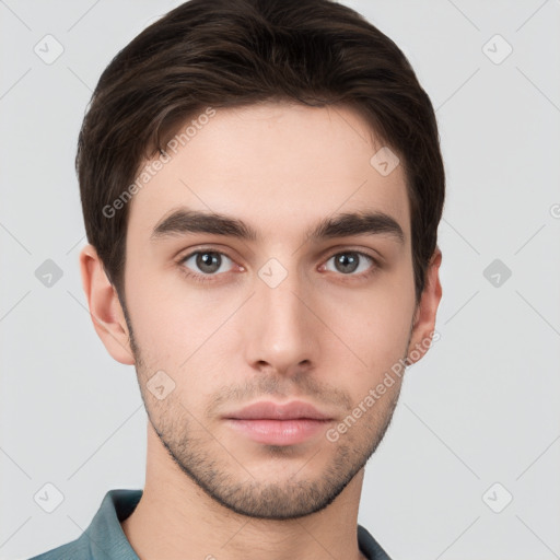 Neutral white young-adult male with short  brown hair and brown eyes