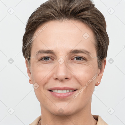 Joyful white young-adult female with short  brown hair and grey eyes