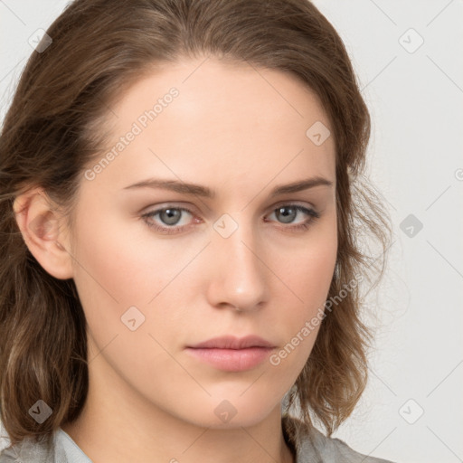 Neutral white young-adult female with medium  brown hair and grey eyes