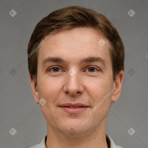 Joyful white adult male with short  brown hair and grey eyes