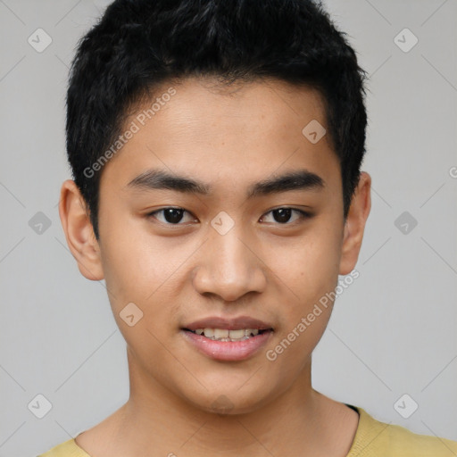 Joyful asian young-adult male with short  black hair and brown eyes