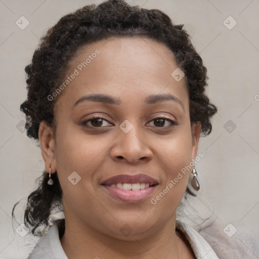 Joyful black young-adult female with medium  brown hair and brown eyes