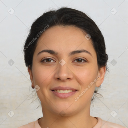 Joyful latino young-adult female with medium  brown hair and brown eyes