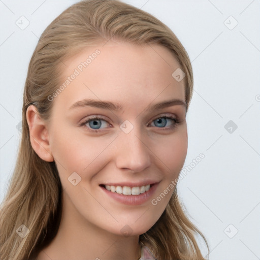 Joyful white young-adult female with long  brown hair and blue eyes