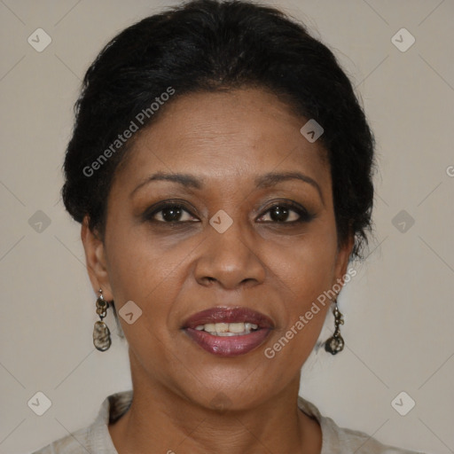 Joyful black adult female with short  brown hair and brown eyes