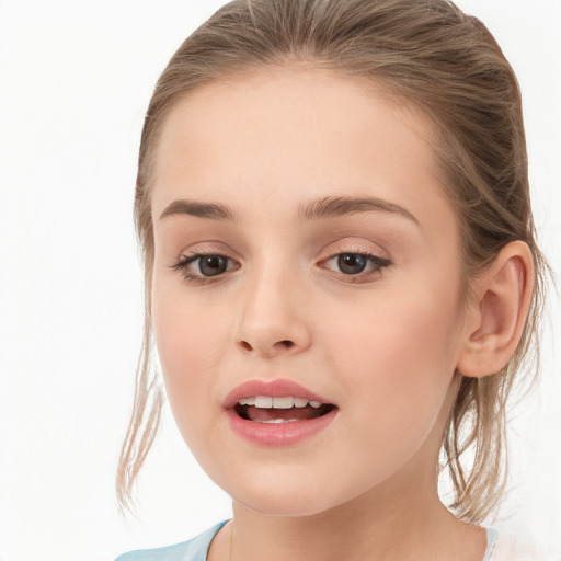 Joyful white child female with medium  brown hair and brown eyes