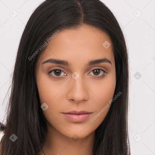 Neutral white young-adult female with long  brown hair and brown eyes