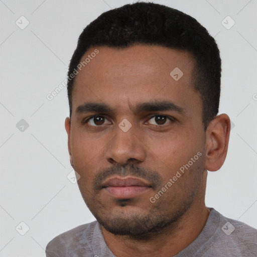 Neutral latino young-adult male with short  black hair and brown eyes