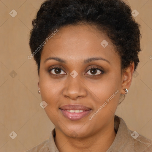 Joyful black young-adult female with short  brown hair and brown eyes