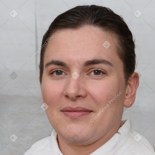 Joyful white young-adult female with short  brown hair and brown eyes