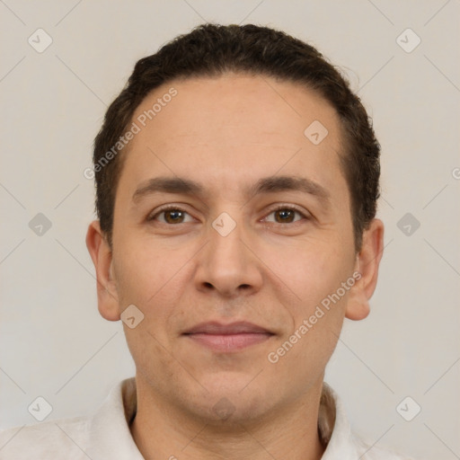 Joyful white adult male with short  brown hair and brown eyes