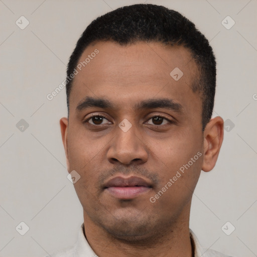 Neutral latino young-adult male with short  black hair and brown eyes