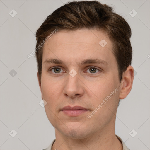 Neutral white young-adult male with short  brown hair and grey eyes