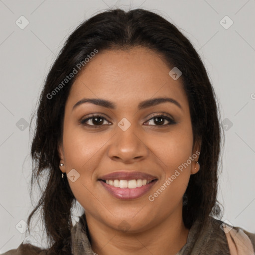 Joyful latino young-adult female with long  brown hair and brown eyes