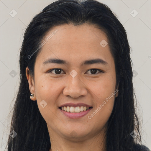 Joyful asian young-adult female with long  brown hair and brown eyes