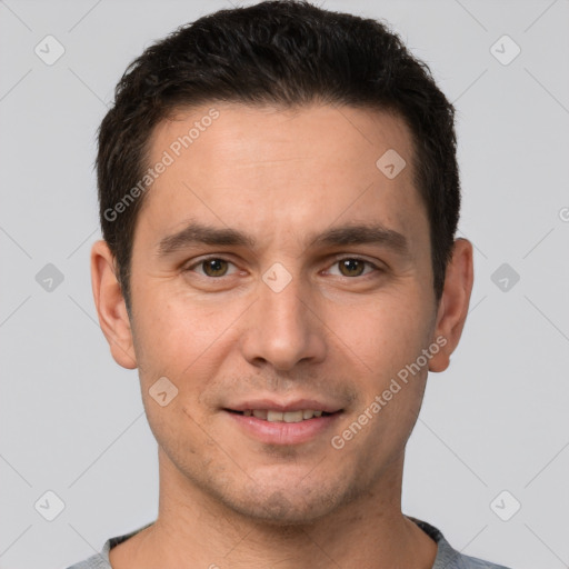 Joyful white young-adult male with short  brown hair and brown eyes