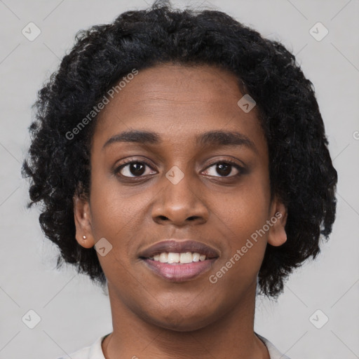 Joyful black young-adult female with short  black hair and brown eyes