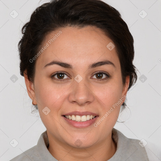 Joyful white adult female with short  brown hair and brown eyes