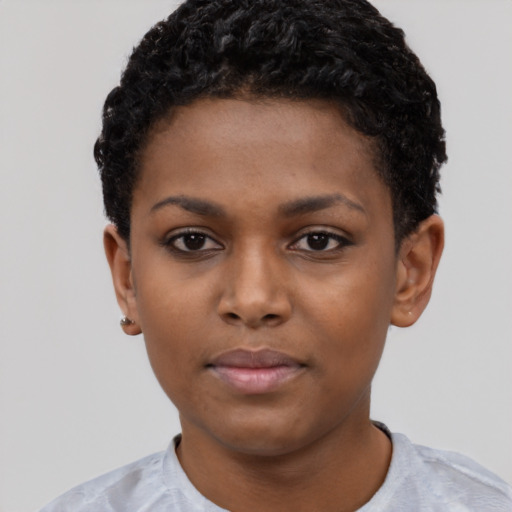 Neutral black young-adult female with short  black hair and brown eyes
