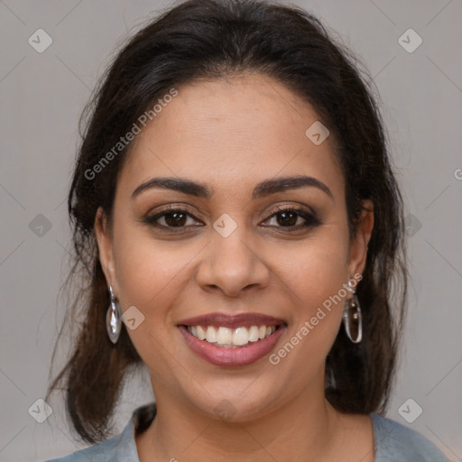 Joyful latino young-adult female with medium  brown hair and brown eyes