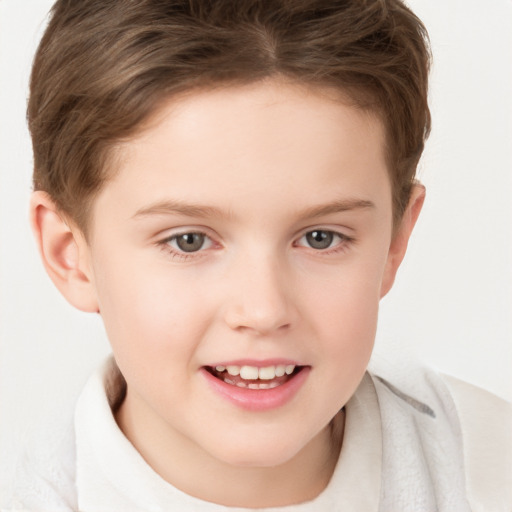 Joyful white child female with short  brown hair and grey eyes