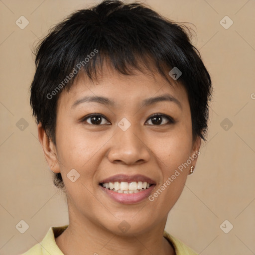 Joyful asian young-adult female with short  brown hair and brown eyes