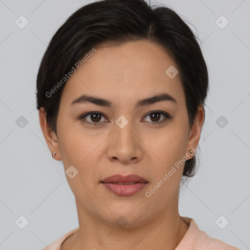 Joyful latino young-adult female with short  brown hair and brown eyes