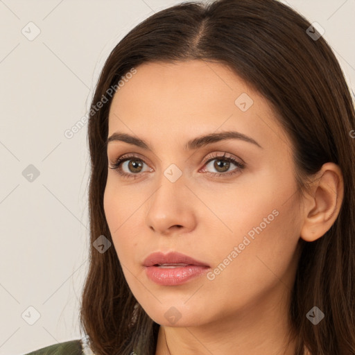 Neutral white young-adult female with long  brown hair and brown eyes