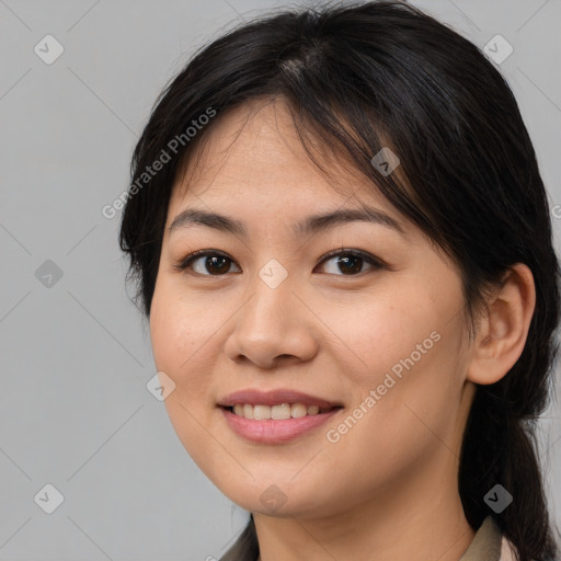 Joyful asian young-adult female with medium  brown hair and brown eyes