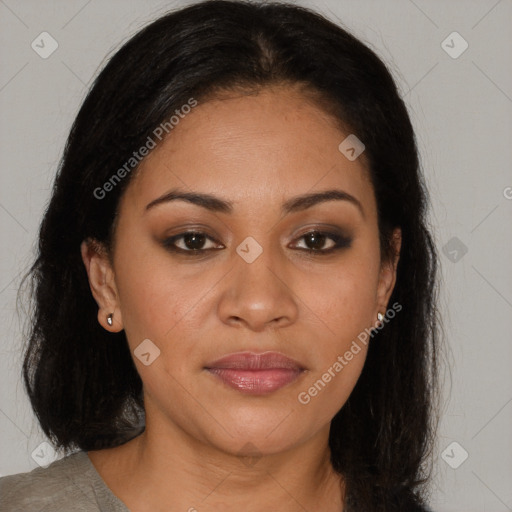 Joyful latino young-adult female with medium  brown hair and brown eyes