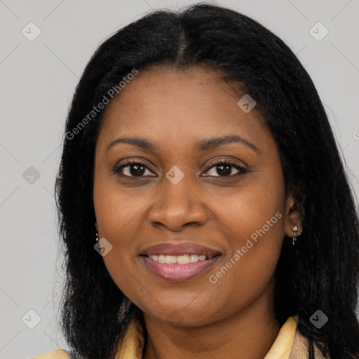 Joyful latino young-adult female with long  black hair and brown eyes