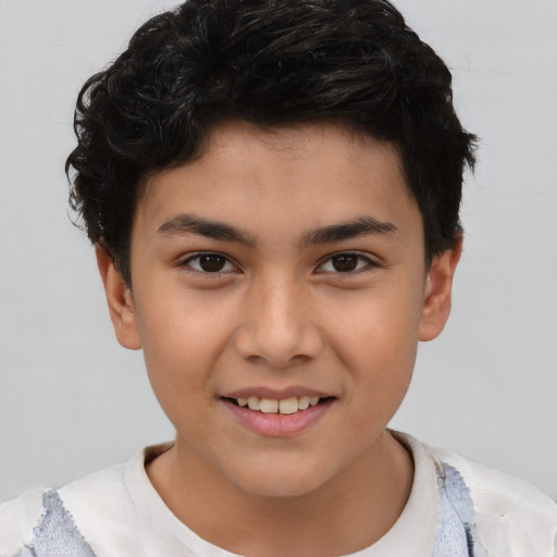 Joyful asian child male with short  brown hair and brown eyes