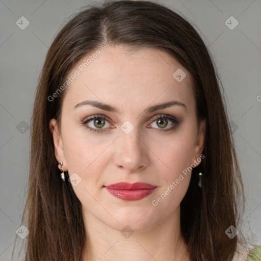 Joyful white young-adult female with long  brown hair and green eyes