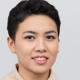 Joyful asian young-adult female with short  brown hair and brown eyes