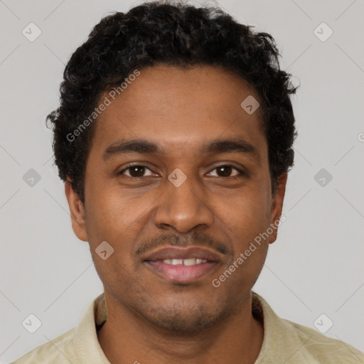 Joyful black young-adult male with short  brown hair and brown eyes