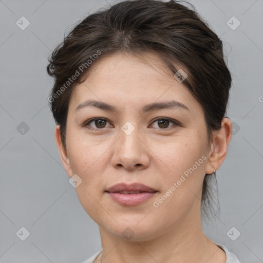 Joyful white young-adult female with medium  brown hair and brown eyes