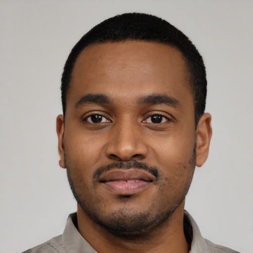 Neutral black young-adult male with short  black hair and brown eyes