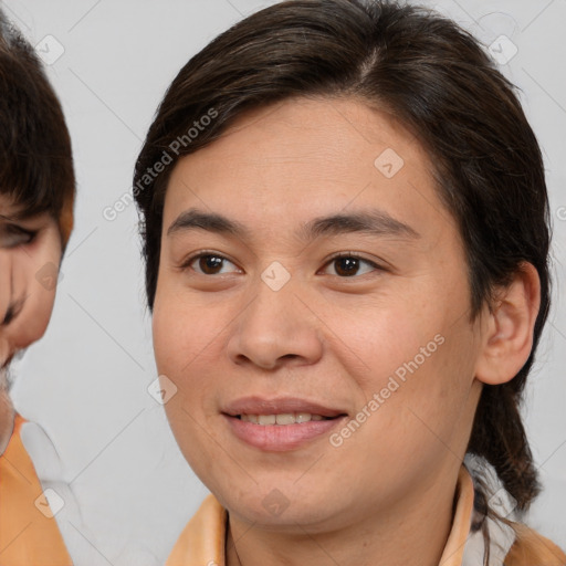 Joyful white young-adult female with medium  brown hair and brown eyes