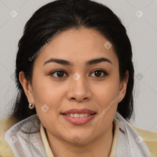 Joyful latino young-adult female with medium  brown hair and brown eyes