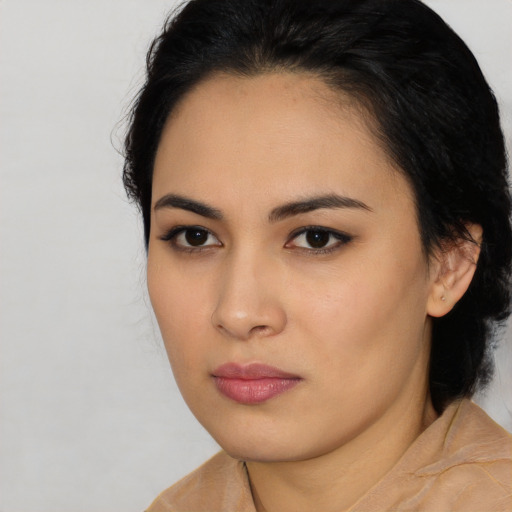 Neutral asian young-adult female with medium  black hair and brown eyes