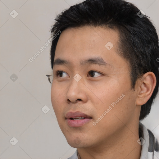 Neutral asian young-adult male with short  black hair and brown eyes