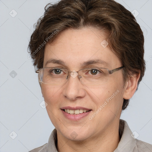 Joyful white adult female with short  brown hair and brown eyes