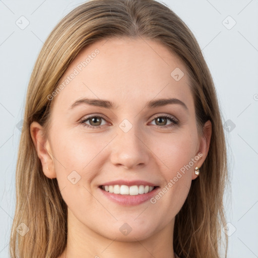 Joyful white young-adult female with long  brown hair and grey eyes