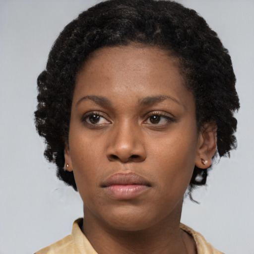 Neutral black young-adult female with short  black hair and brown eyes