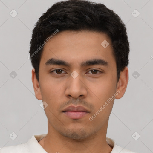 Neutral latino young-adult male with short  black hair and brown eyes