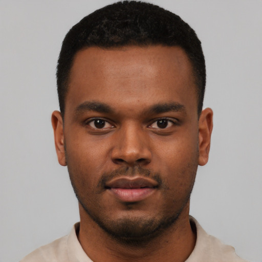 Neutral black young-adult male with short  black hair and brown eyes