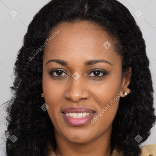 Joyful black young-adult female with long  brown hair and brown eyes