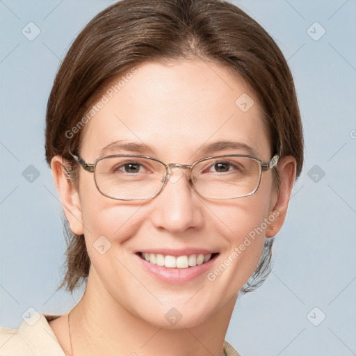 Joyful white adult female with medium  brown hair and grey eyes