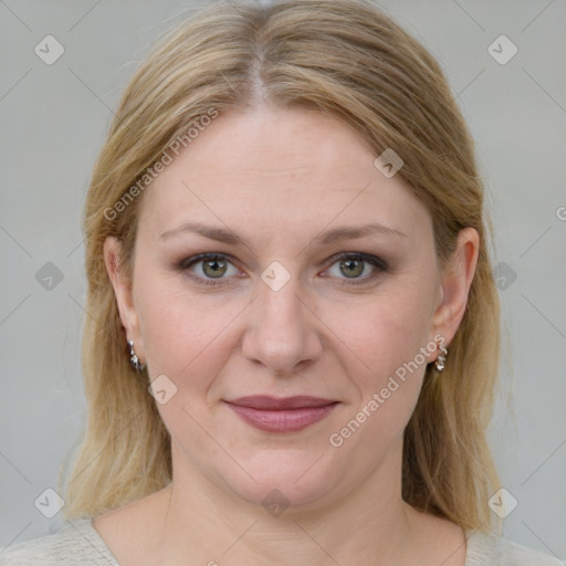 Joyful white young-adult female with medium  brown hair and blue eyes