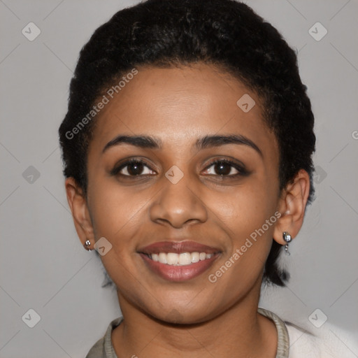 Joyful latino young-adult female with short  black hair and brown eyes